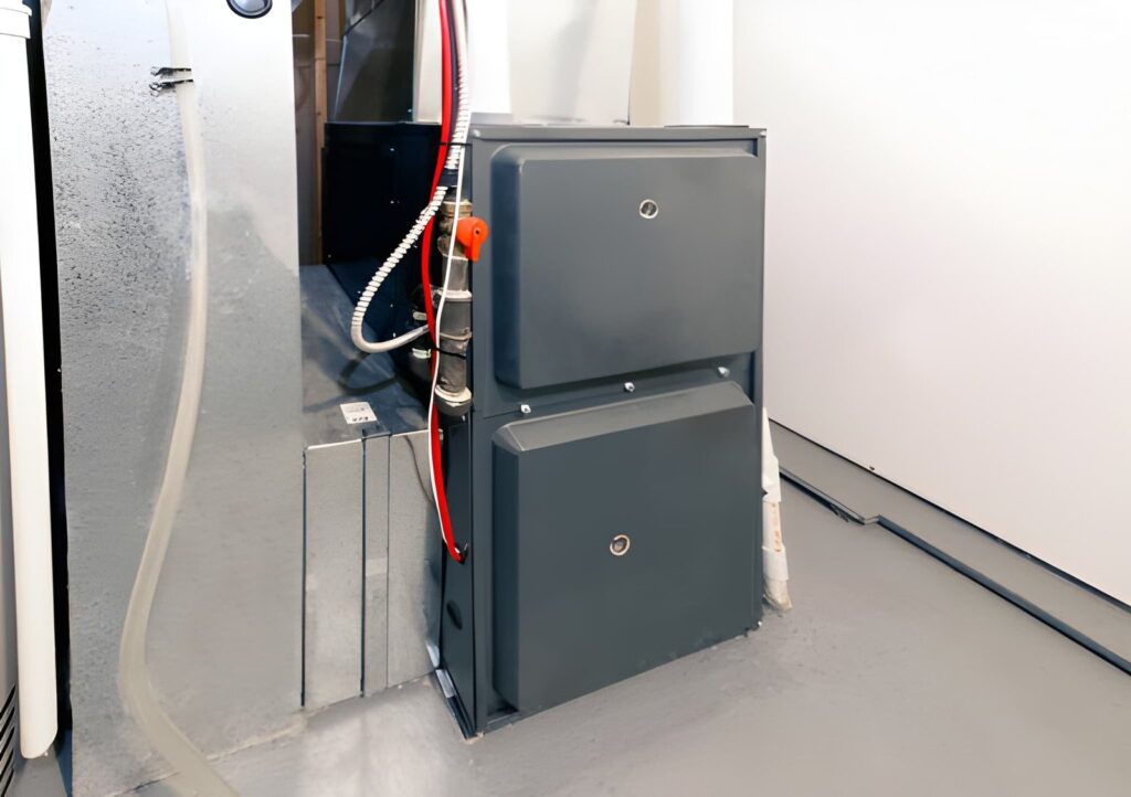Professional furnace installation Ajax technician installing an energy-efficient home heating system.